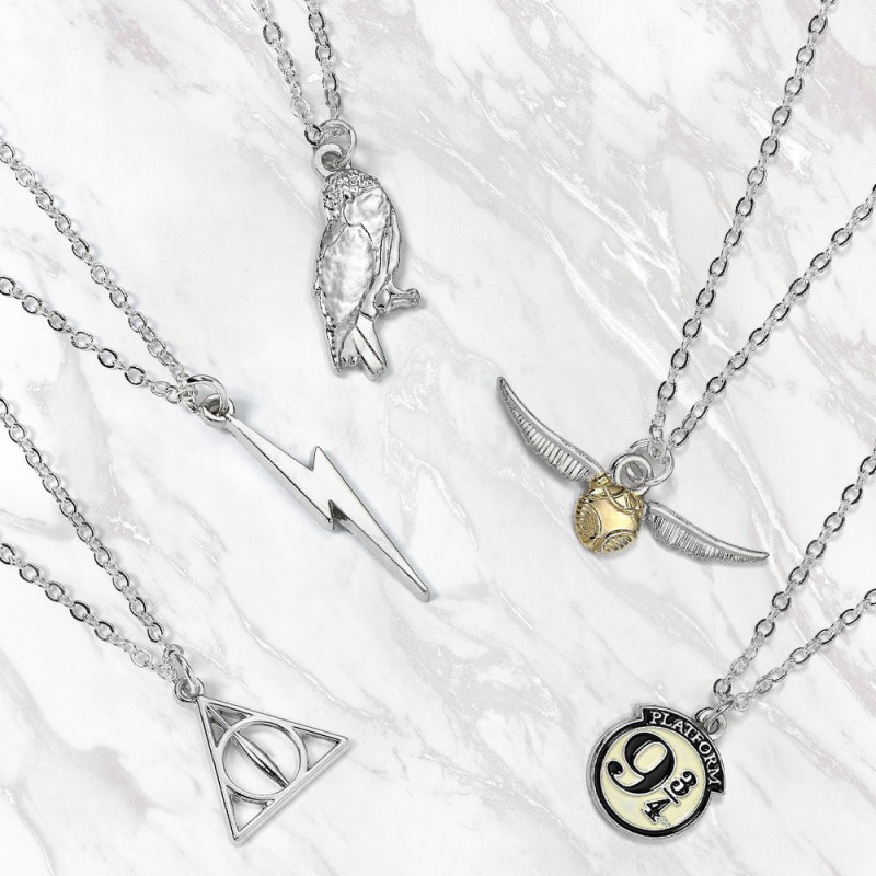 Pendentif Harry Potter avec collier à l'effigie d'un symbole Poudlard sur  Rapid Cadeau